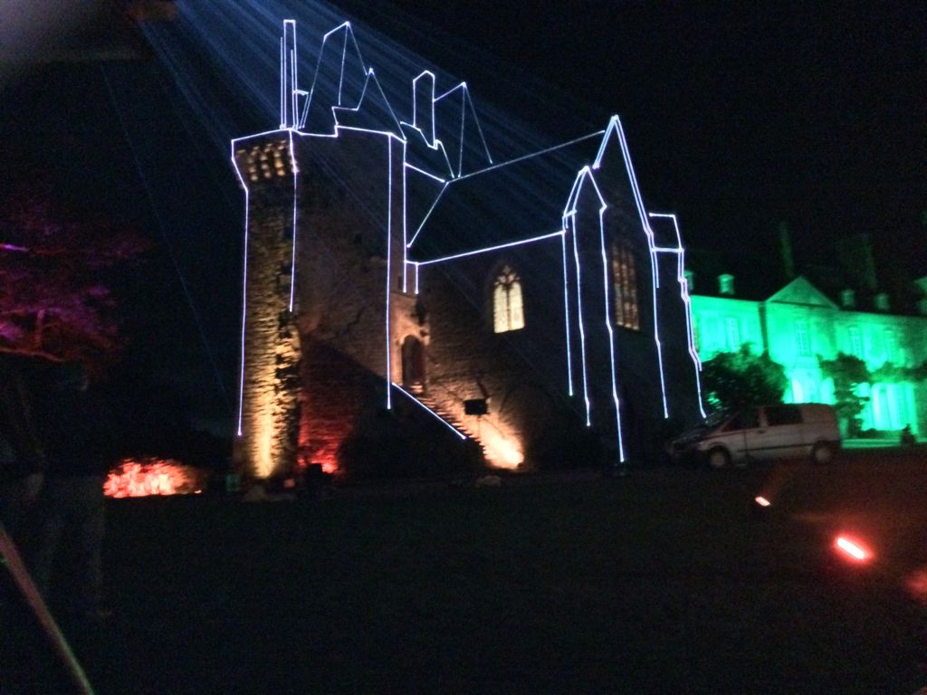 Photo of a building with laser contour projection