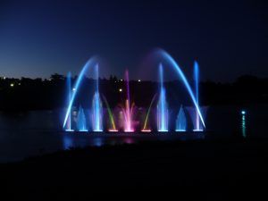 Photo of blue, red and green water jets