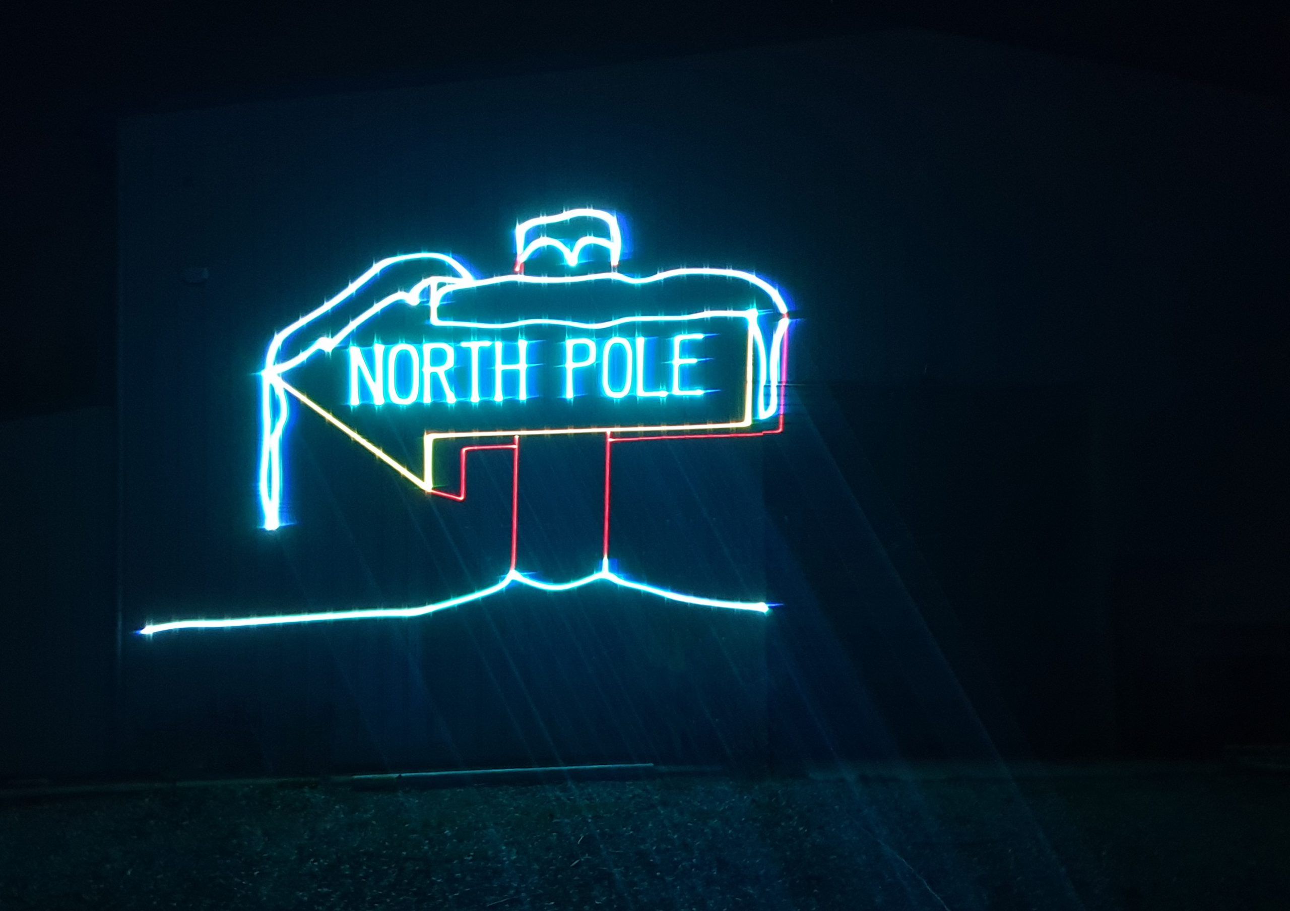 Projection of a laser panel with North Pole written on it