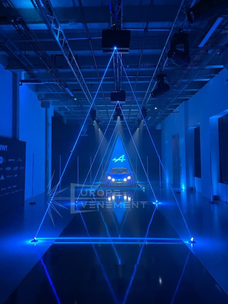 Personalised show - Photo of the alpine car with laser projection creating triangles