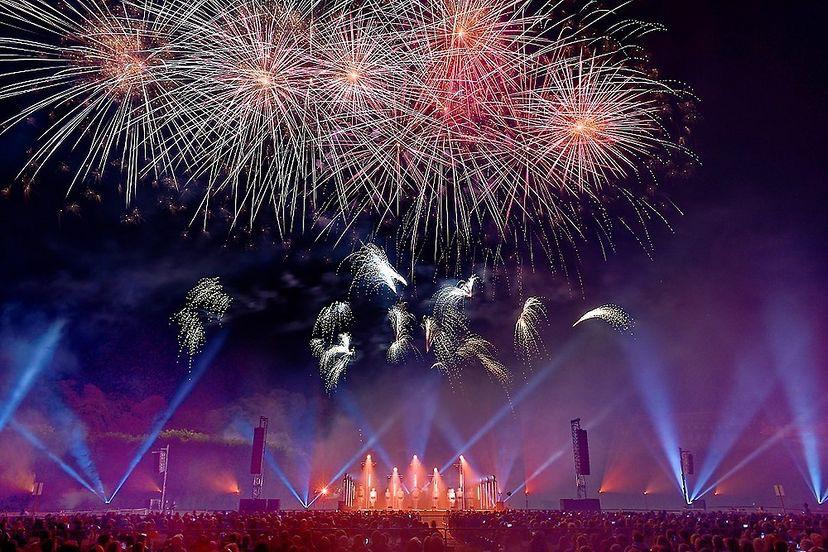 Photo of a pink and blue firework
