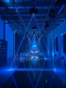 Europe Évènement - Show personnalisé - Photo de la voiture alpine bleu avec projection de lasers en triangle